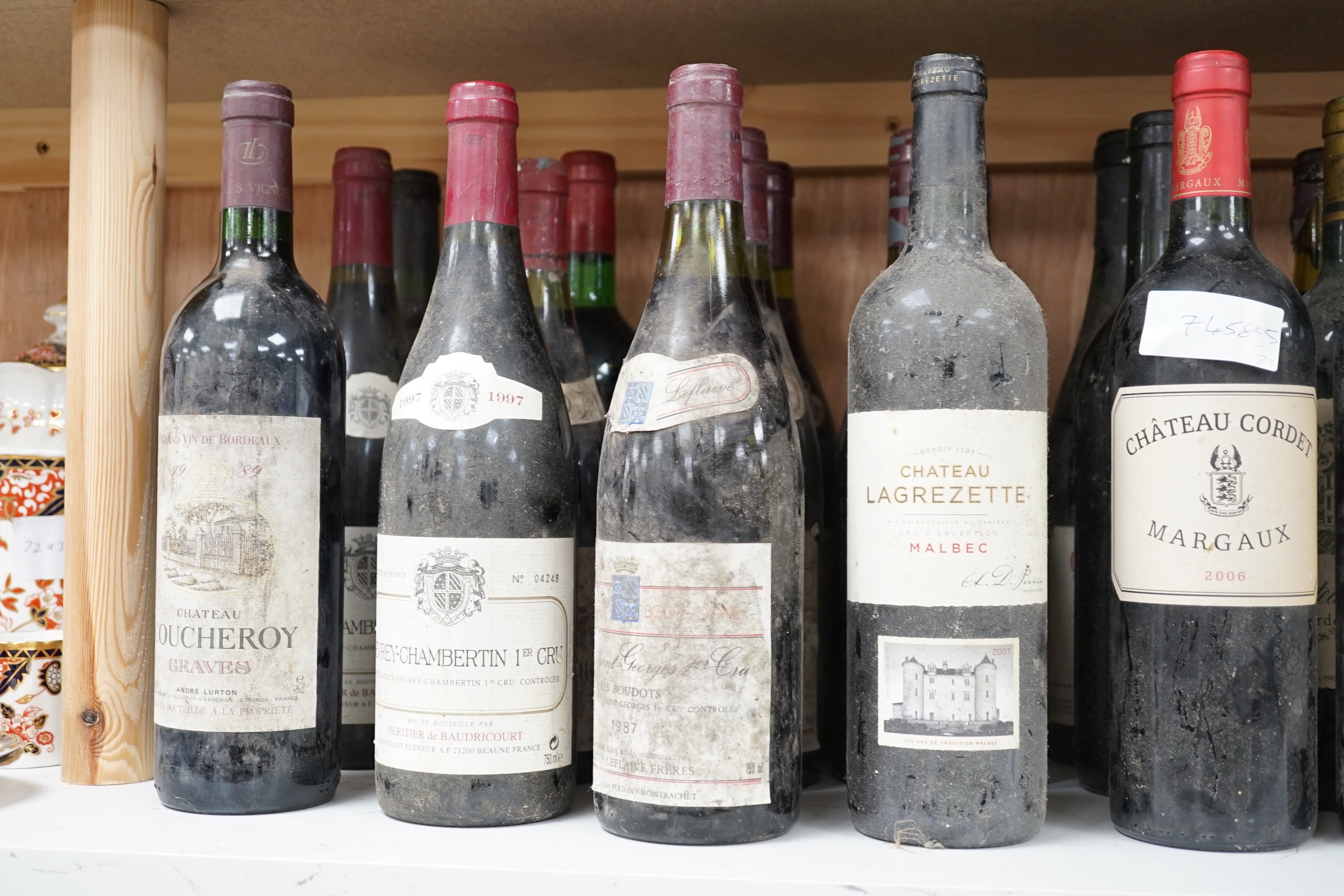 Twenty seven assorted bottles of Bordeaux and Burgundy: 6 bottles of Nuits St Georges 1er Cru 1987, 3 bottles of Chateau Lagrange Pomerol 1979, 2 bottles of Cotes de Brouilly 1988, 3 bottles of Gevrey-Chambertin 1er Cru